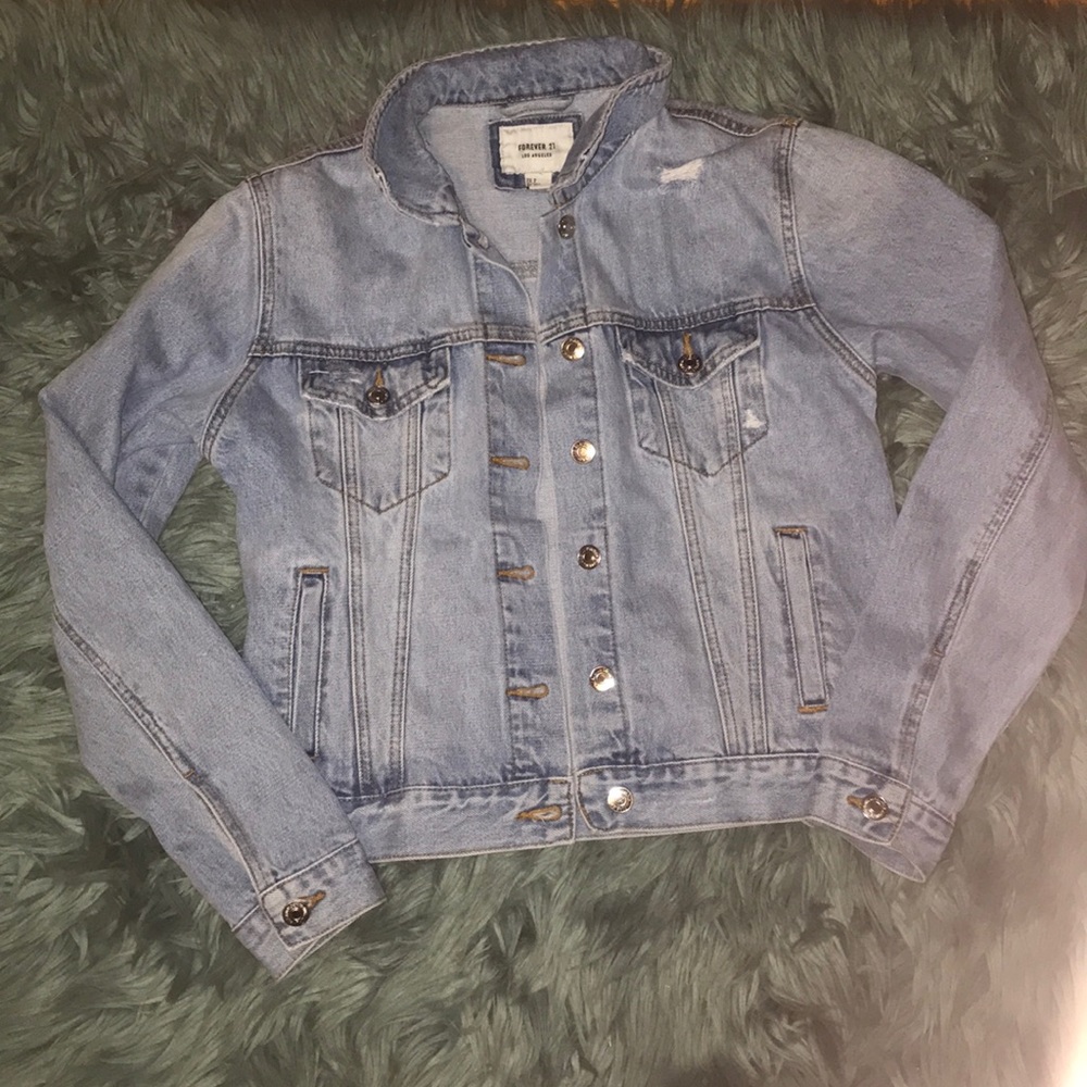 Distressed light wash denim jacket
